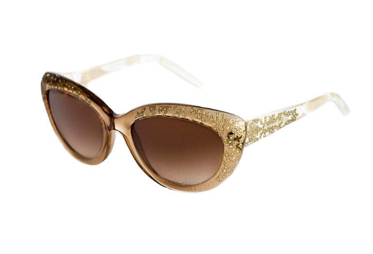 PERLA c.A86 â€“ Translucent bronze front and horn temples with light gold crystals and gold laserwork
